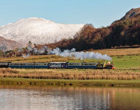 Snowy mountain behind the Ravenglass and Eskdale Railway.