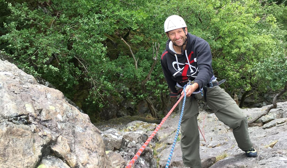 Visitor Abseiling with Rock n Ridge in the Lake District, Cumbria