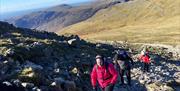 Climbers Hiking Scafell Pike with Rock n Ridge in the Lake District, Cumbria