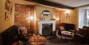 Lounge Seating with Fireplace at The Royal Oak Hotel in Rosthwaite, Lake District