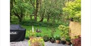 Patio and garden at The Saplings in Bothel, Cumbria
