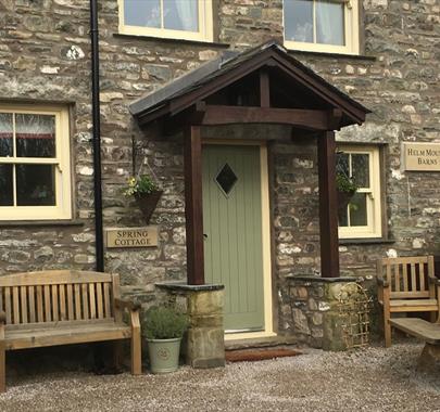 Exterior and Outdoor Seating at Spring Cottage at Helm Mount Lodge & Cottages in Barrows Green, Cumbria