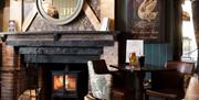 Cosy Fireplace in the Dining Room at The Swan at Grasmere in the Lake District, Cumbria