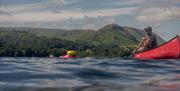Visitors Swimming and Canoeing on Holidays with SwimTrek in the Lake District, Cumbria