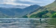 Visitors Canoeing on Holidays with SwimTrek in the Lake District, Cumbria