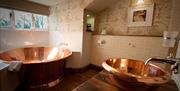 A luxury bathroom at The Wild Boar Inn