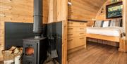 Pod Interior and Wood Burner at The Yan Glamping in Grasmere, Lake District