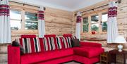 Lounge in a Log Cabin at Thornthwaite Farm in Broughton-in-Furness, Lake District