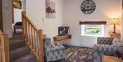 Lounge and Stairs at The Hidden Place at Ullswater Holiday Park in the Lake District, Cumbria