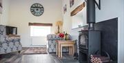 Real Wood Burner and Lounge at The Hidden Place at Ullswater Holiday Park in the Lake District, Cumbria