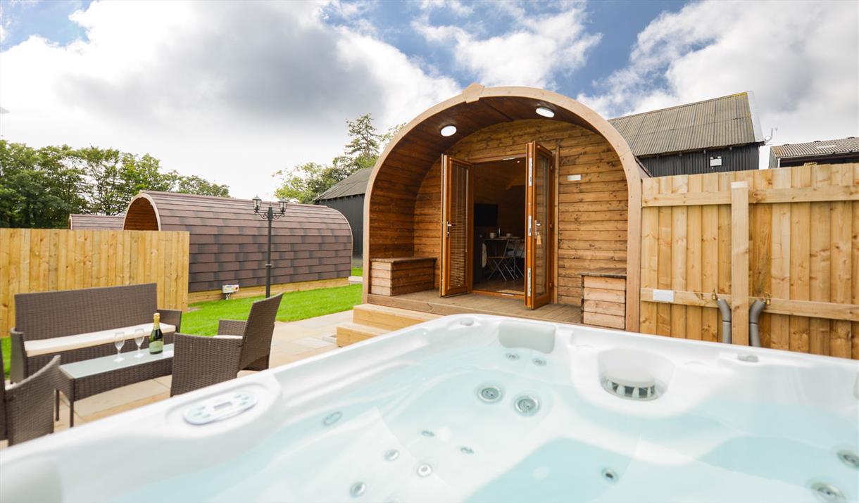 Exterior of Wellington Farm Glamping Pod, with Outdoor Seating and Hot Tub, in Cockermouth, Cumbria