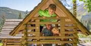 Children on a Playset at Whinlatter Forest in the Lake District, Cumbria