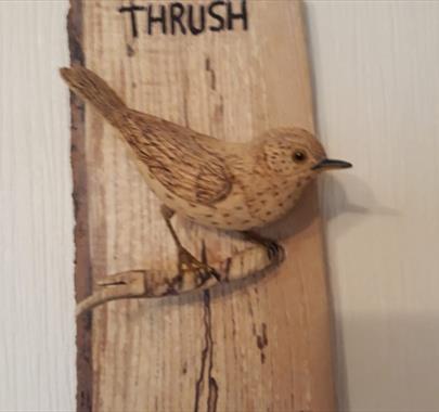 Bird whittling at Quirky Workshops at Greystoke Craft Barn & Gardens in Penrith, Cumbria