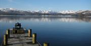 View from a Jetty over Windermere in Winter in the Lake District, Cumbria
