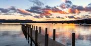 View from a Pier over Lake Windermere at Sunset in the Lake District, Cumbria