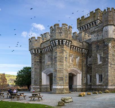 Exterior and picnic tables at Wray Castle, Low Wray, Ambleside, Lake District