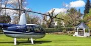 Helicopter landing at Broadoaks Country House in Troutbeck, Lake District