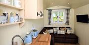 Kitchen and Couch at Reiver's Retreat at Low Moor Head Farm in Longtown, Cumbria