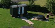 Exterior and Hot Tub at Reiver's Retreat at Low Moor Head Farm in Longtown, Cumbria