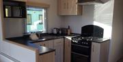 Kitchen inside a Caravan at Spoon Hall Caravans near Coniston, Lake District