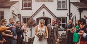 Newlyweds at The Wild Boar Inn in Windermere, Lake District