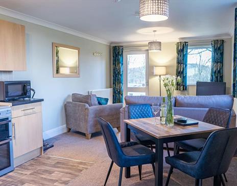 Lounge and kitchen at Treetops Self Catering Apartment at Woodclose Park in Kirkby Lonsdale, Cumbria