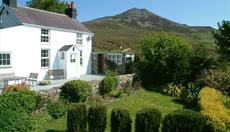 Gors-lwyd Cottage with Yr Eifl the highest peak on the Llyn Peninsula