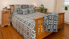 image 1 & 2 Welsh tapestry bedspreads woven on site.  Image 3 - shuttle on loom