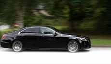 Image shows Black S-Class Mercedes
