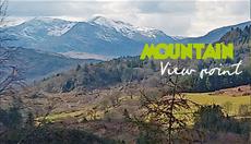 Scooter route view of Snowdonia mountain range