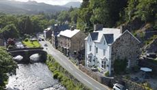 Aerial view of Plas Tan y Graig B&B Guest House with bridge over Afon Colwyn