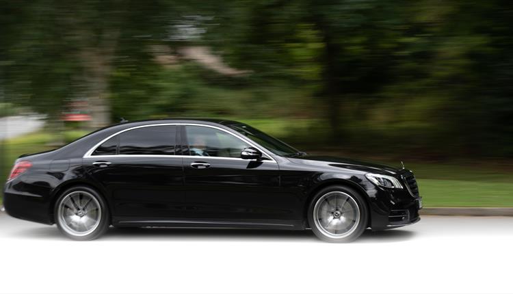 Image shows Black S-Class Mercedes
