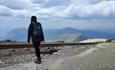 hiker approaching the summit of snowdon