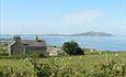 Pen y Graig farmhouse & B&B apartment over looking the sea at Church Bay