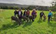 Group walk the Donkeys in the field before heading up the hills