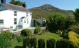 Gors-lwyd Cottage with Yr Eifl the highest peak on the Llyn Peninsula