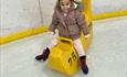 skating aid with child