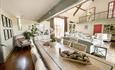 Wooden dining table with a wooden tray of wood acrons.