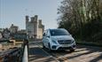 Celticos Tour vehicle near Caernarfon Castle