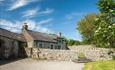 The Fancy House is a detached luxury holiday cottage, with views looking out over farmland and towards the sea. It sits in a quiet corner of Plas Llig