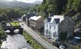 Aerial view of Plas Tan y Graig B&B Guest House with bridge over Afon Colwyn