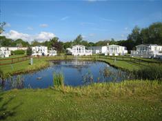 Fir Trees Caravan and Lodge Park - Pond View