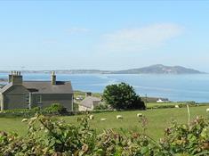 Pen y Graig farmhouse & B&B apartment over looking the sea at Church Bay