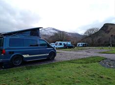 Cae Du campervan with snow capped mountain - lightened view