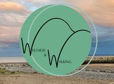 Wellness and Walkig Holidays logo on picture of Rhos on Sea beach