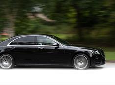 Image shows Black S-Class Mercedes