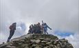 hikers on the summit of snowdon