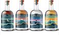 Four Anglesey Rum Co bottles in a row