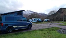 Cae Du campervan with snow capped mountain - lightened view