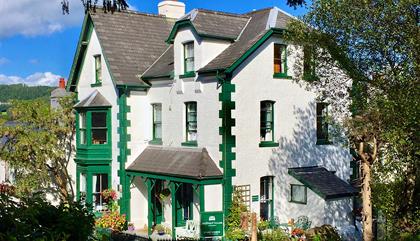 The exterior of the building Crafnant House - a bed and breakfast on the main road in the village of Trefriw in Wales